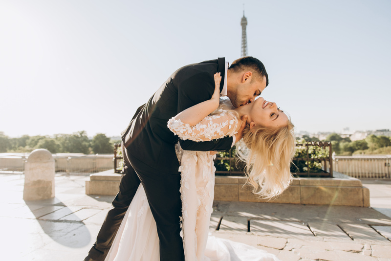 Groom Kissing Bride Neck